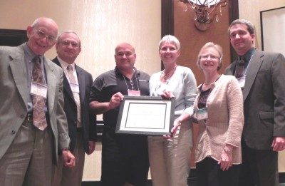 Receiving award at Annual Conference